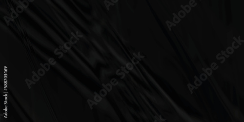 Black paper texture . Dark black wrinkled paper texture. Black crumpled paper texture . black crumpled and top view textures can be used for background of text or any contents .