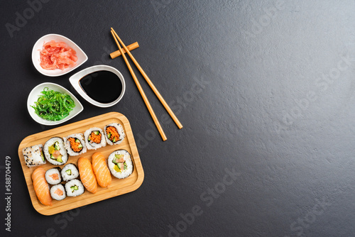Japanese sushi with soy sauce, ginger and algae salad
