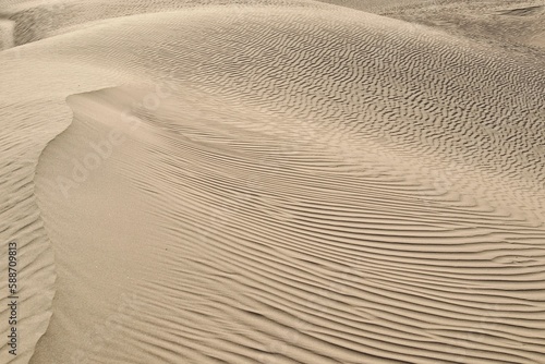 Closeup shot of textured sand dunes in a desert