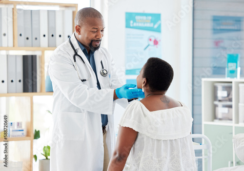 Black man, senior doctor and patient with sore throat, medical examination, consultation in hospital and healthcare. Communication, woman and man check tonsils with medicine professional and health