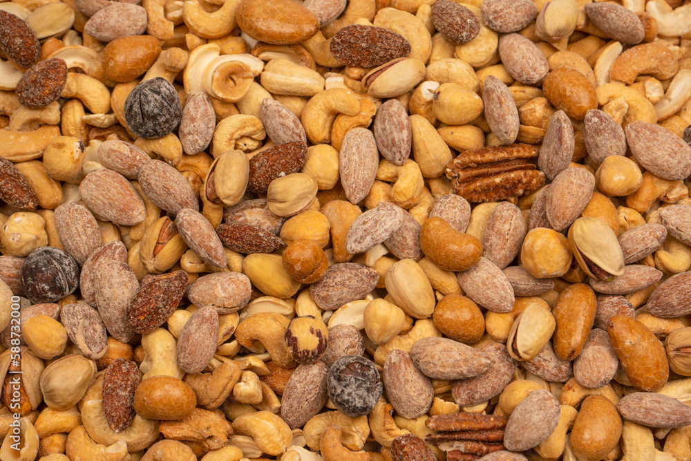 A group of almonds, pistachios, walnuts, macadamia, cashews. A group of almonds, pistachios, walnuts, macadamia, cashews.