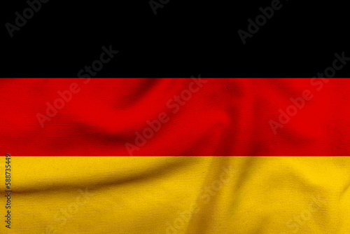 Modern German Flag Design on Textured Cloth  A Contemporary Interpretation of the Iconic Black  Red  and Gold Colors. Closeup View of Germany Flag Texture for Digital and Print Projects