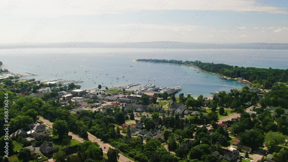 Pan up Harbor Springs Great Lakes Up North Drone forward movement beautiful summer day Pan up Harbor Springs Great Lakes Up North Drone forward movement beautiful summer day