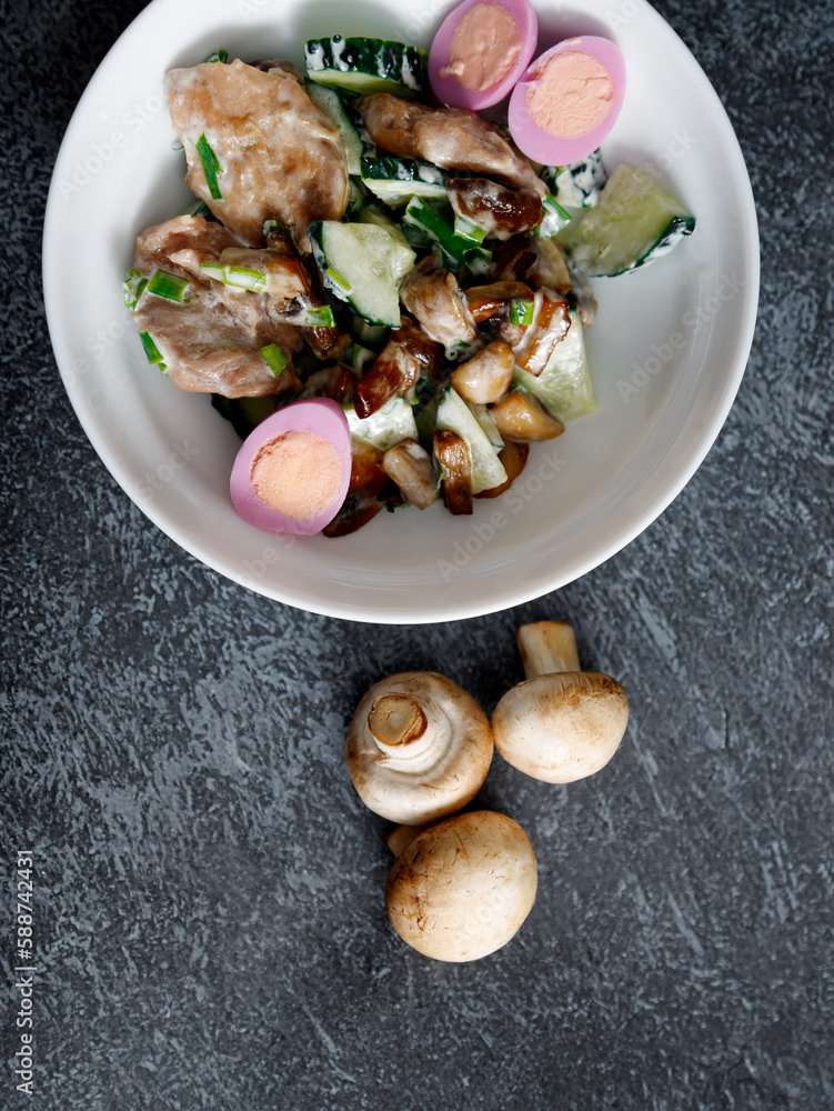 warm salad with chicken breast, mushrooms, egg and fresh arugula. warm salad with chicken breast, mushrooms, egg and fresh arugula.