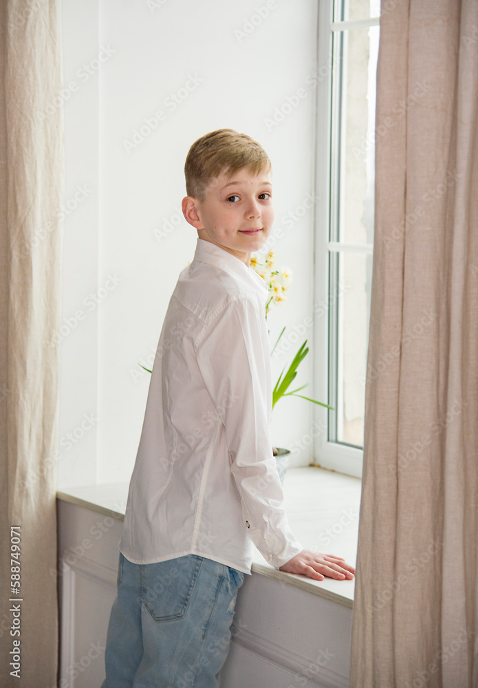 little child looking out window little child looking out window