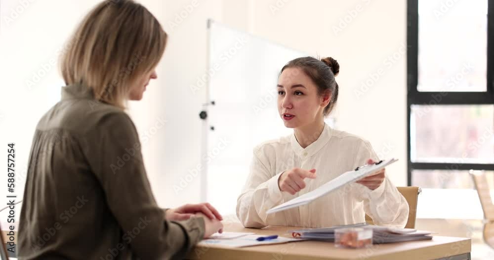 Frustrated exhausted female manager receives work report with error. Bank debt and bad news Frustrated exhausted female manager receives work report with error. Bank debt and bad news