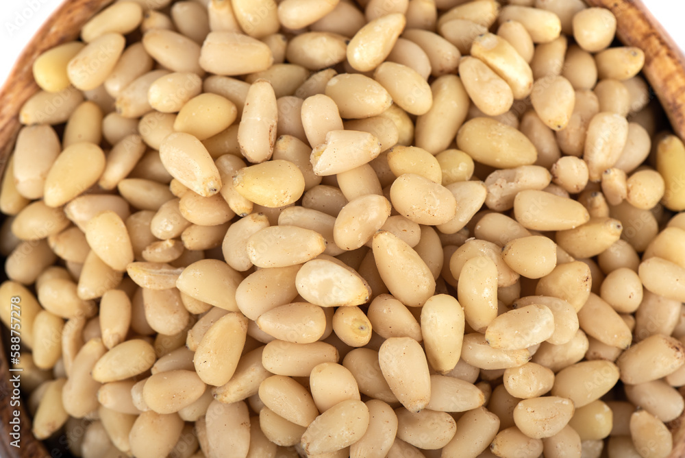 Close-up top view of peeled pine nuts. Close-up top view of peeled pine nuts.