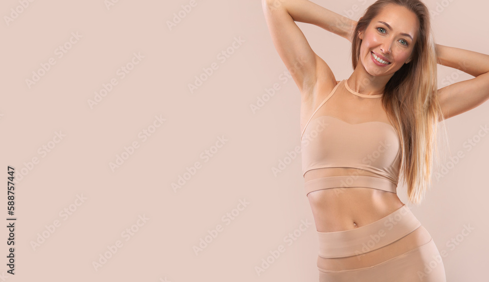 Naklejka premium Download banner mockup for yoga and fitness classes advertisment. Yoga asana Indoor. Sports recreation. Beautiful young woman in yoga pose. Individual sports.
