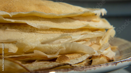 Stack of pancakes baked from white wheat flour, national cuisine, cooking traditions, carbohydrate foods, gluten-free diet, healthy eating