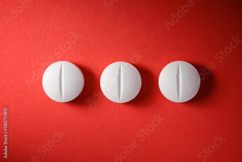 White medicine tablets on a table