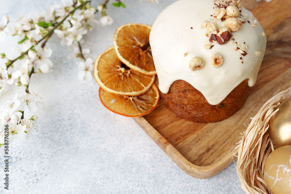 Fototapeta premium Traditional Easter cake with nuts on gray background