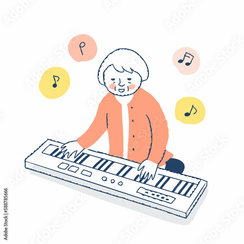 電子ピアノを演奏しているシニア女性 photo