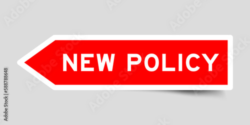 Red color arrow shape sticker label with word new policy on gray background