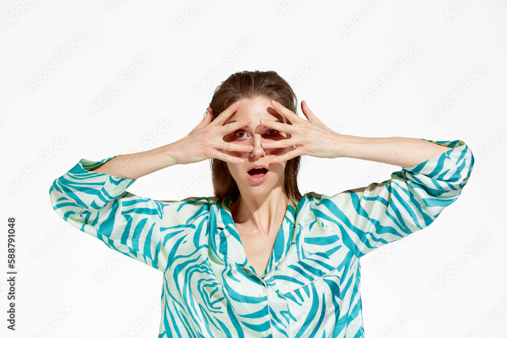 Portrait with one young woman with perfect skin grimacing with pleasure over white background. Close up Portrait with one young woman with perfect skin grimacing with pleasure over white background. Close up