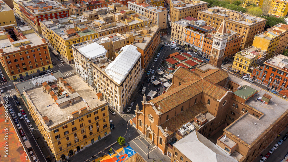 Naklejka premium Aerial view of the church of St. Mary Immaculate and St. John Berchmans in the Immaculate Square. It is a place of Catholic worship located in the San Lorenzo district, Rome, Italy.