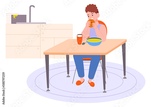 Boy eating healthy breakfast. Kid sit at kitchen table