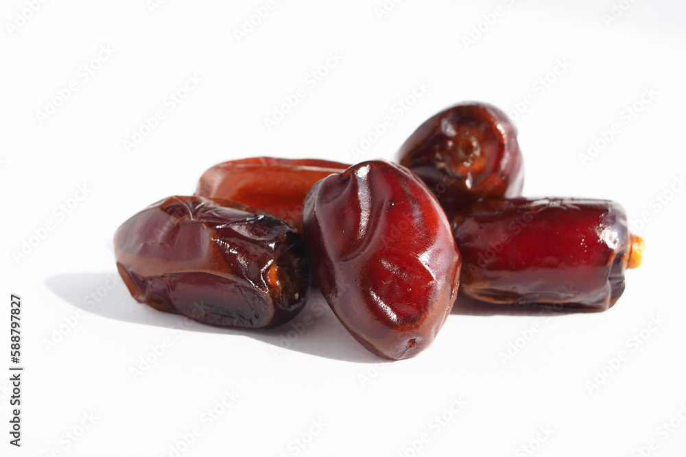 Ripe delicious fruit dates on a white background. dried date fruit Ripe delicious fruit dates on a white background. dried date fruit