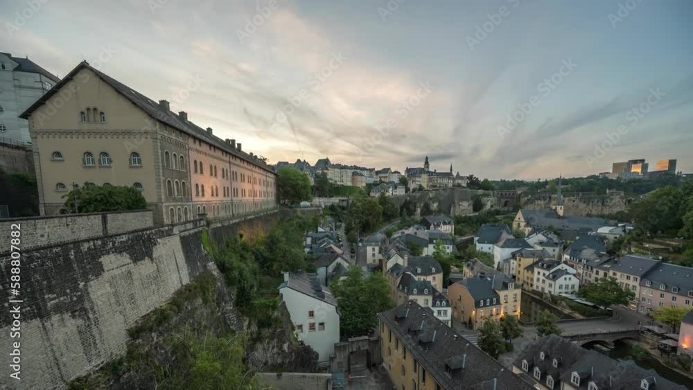 Grand Duchy of Luxembourg time lapse 4K, city skyline day to night timelapse at Grund along Alzette river in the historical old town of Luxembourg Grand Duchy of Luxembourg time lapse 4K, city skyline day to night timelapse at Grund along Alzette river in the historical old town of Luxembourg