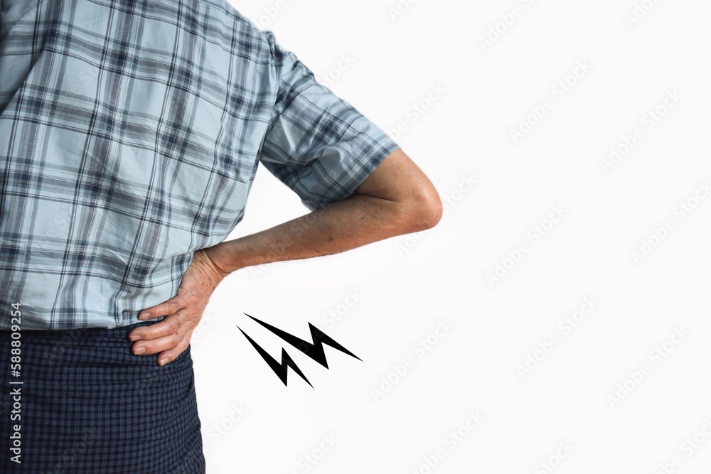 Asian man suffering from right sided low back and loin pain. It can be caused by mechanical or pathological process.
