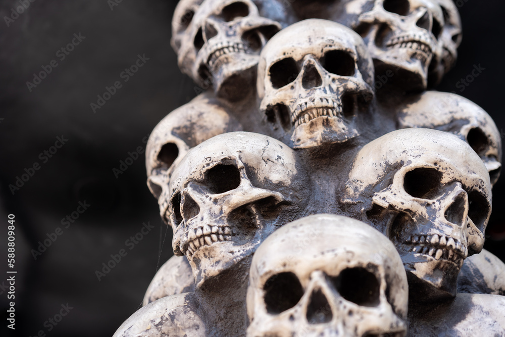 Skull Halloween Background Many People Skulls Stand on top of each other. Mystic creepy concept. Abstract nightmare occult memorial