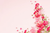 beautiful spring flowers on pink background