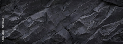 ごつごつした岩肌の背景　テクスチャ　黒