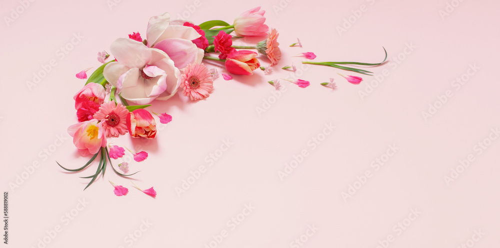 Fototapeta premium beautiful spring flowers on pink background