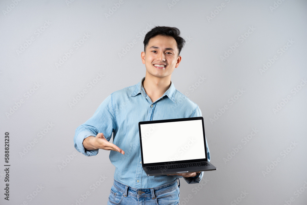 image of young businessman male on gray background