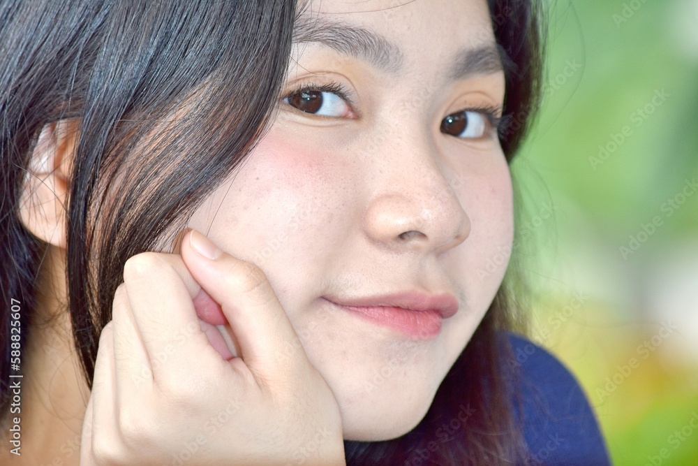 A Happy Youthful Chinese Adult Female A Happy Youthful Chinese Adult Female