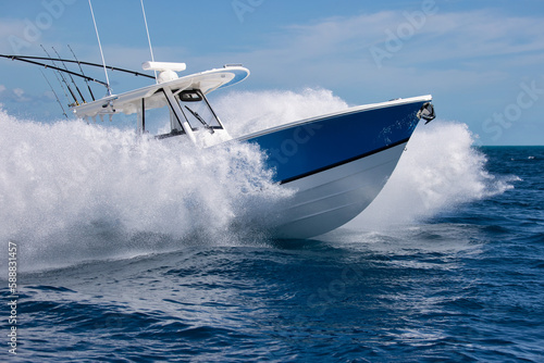 Close-up of a fast center console boat making spray.
