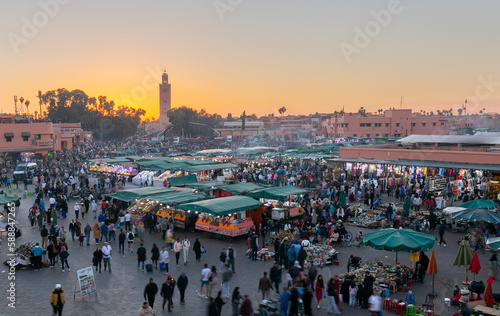 Marrakesh, 01/01/2023: Jamaa el Fna market square, Marrakesh, Morocco, North Africa. Jemaa el-Fnaa, Djema el-Fna or Djemaa el-Fnaa is a famous square and market in the medina quarter of Marrakech. photo