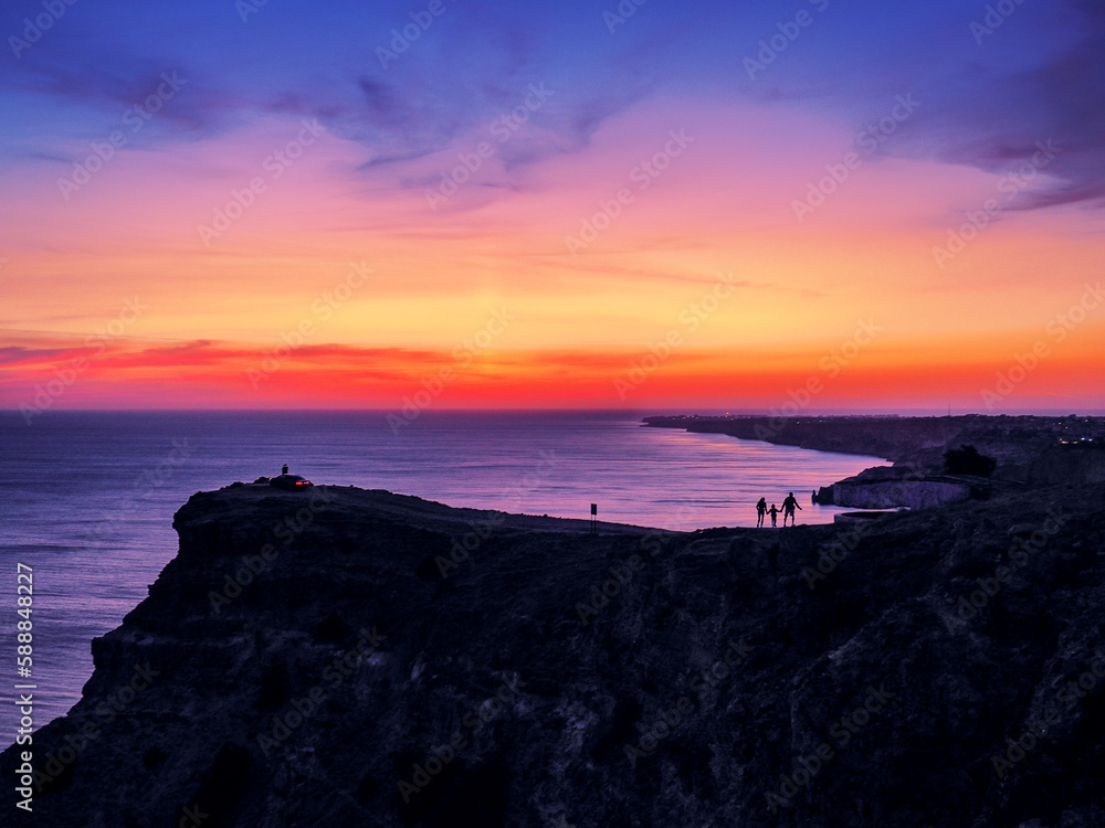 Beautiful colorful sunset at the montains at the sea