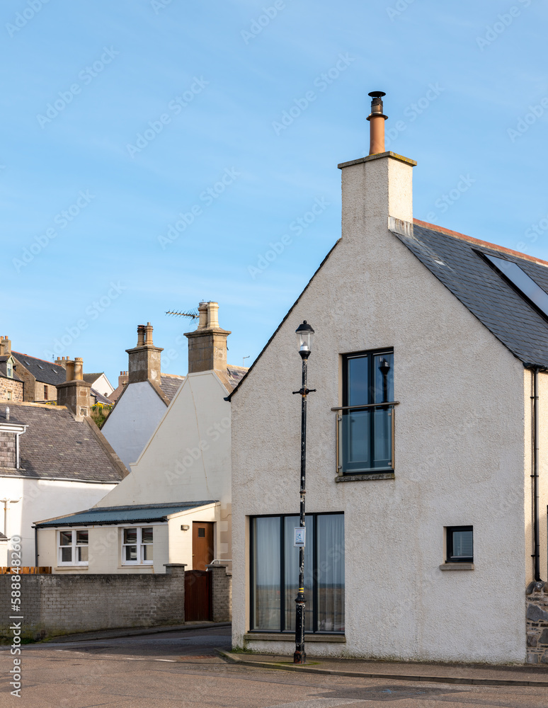 Fototapeta premium 3 April 2023. Seatown,Cullen,Moray,Scotland. This is some street architecture within the old fishing town part of Cullen on the Moray Coast on a very sunny April afternoon in Spring.