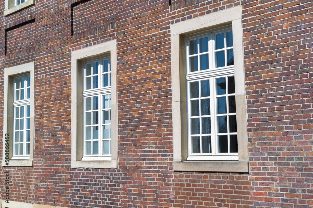 old brick building with windows old brick building with windows