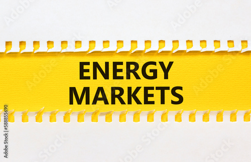 Energy markets symbol. Concept words Energy markets on yellow paper. Beautiful yellow table white background. Business energy markets concept. Copy space.