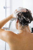 girl showering. girl showering. Girl lathering her hair