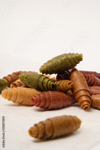 Pattern pastila fruit leather rolls up with fruits on white background. Vertically. photo