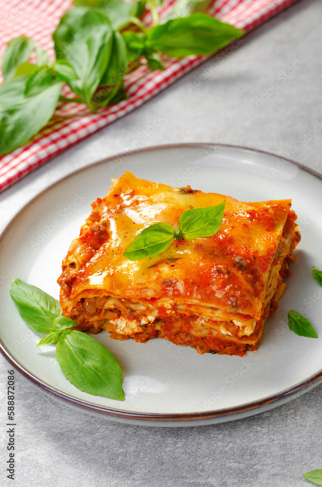 Delicious Homemade Lasagna with Bolognese Sauce on Bright Background, Italian Cuisine, Tasty Baked Lasagna