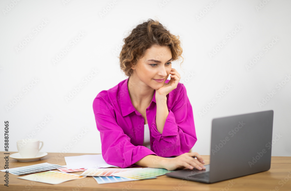 Beautiful Graphic Designer Woman Working With Laptop And Color Samples At Home Beautiful Graphic Designer Woman Working With Laptop And Color Samples At Home