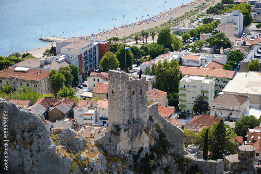 Mirabela Fortress (Peovica) in Omis, Croatia. Ruins of a hilltop fortress with views of the sea and the old town.