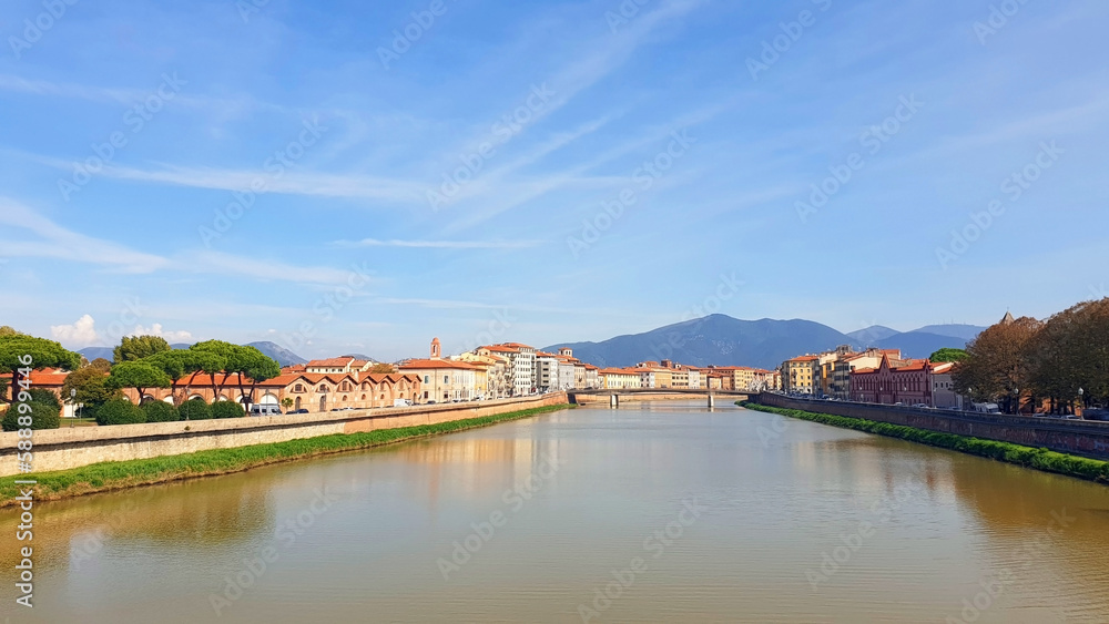Cityscape of the city of Pisa with the river Arno. Panorama.