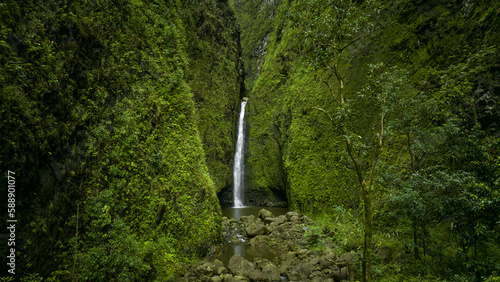 Hawaii waterfall. Green Hawaiian hike nature. Travel destination.