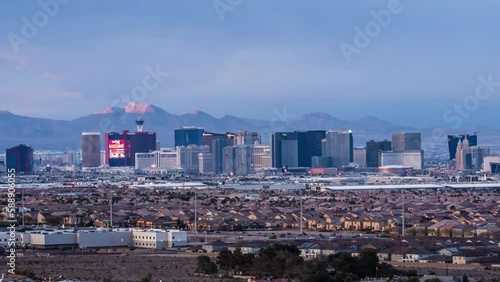 Time Lapse of fabulous Las Vegas in deserts area from day to night. Landscape big city with a lot of casinos and hotels in Nevada state.