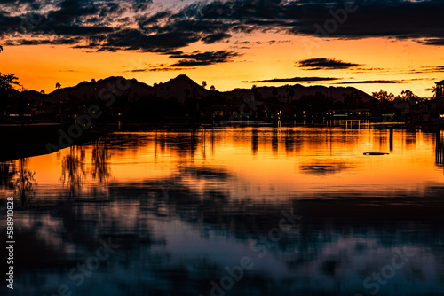 Sunset reflected on the tranquil lake in Arizona