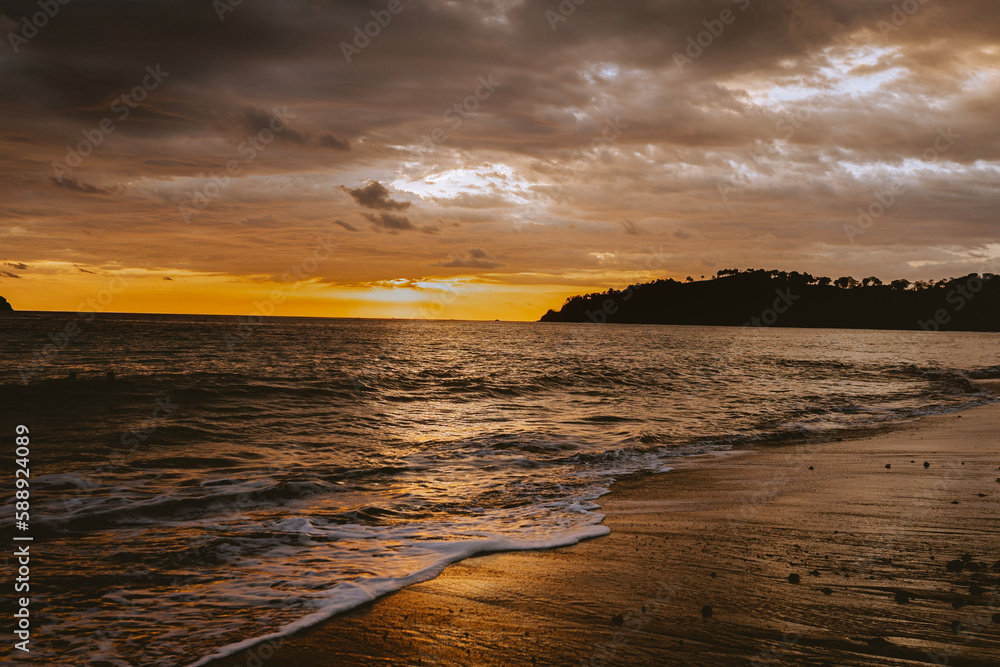 Naklejka premium sunset on the beach