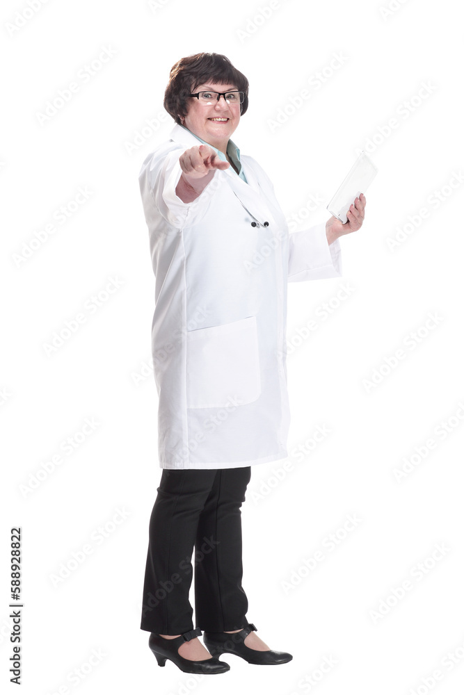 in full growth. senior female doctor with a digital tablet . in full growth. senior female doctor with a digital tablet .