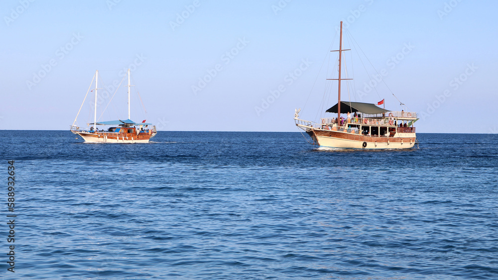 Small cruise boats in the sea