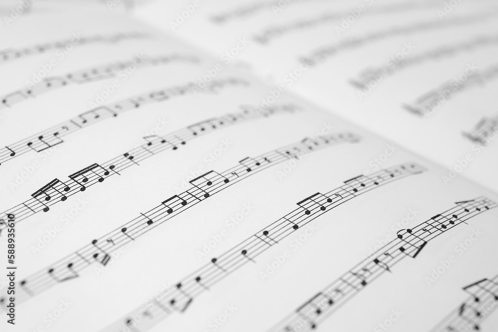 Sheet music book as background, closeup view Sheet music book as background, closeup view