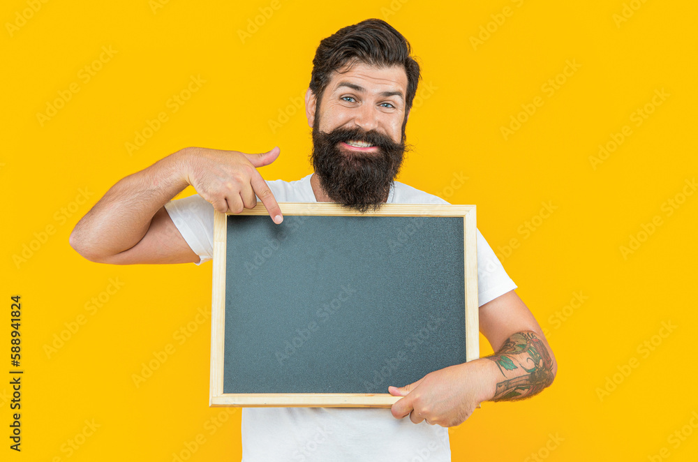 smiling announcement man with offer isolated on yellow. announcement man with offer smiling announcement man with offer isolated on yellow. announcement man with offer