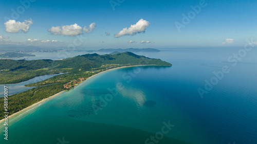 Aerial view of Borneo island coastline with beach and Kota Kinabalu city view. Malaysia. photo